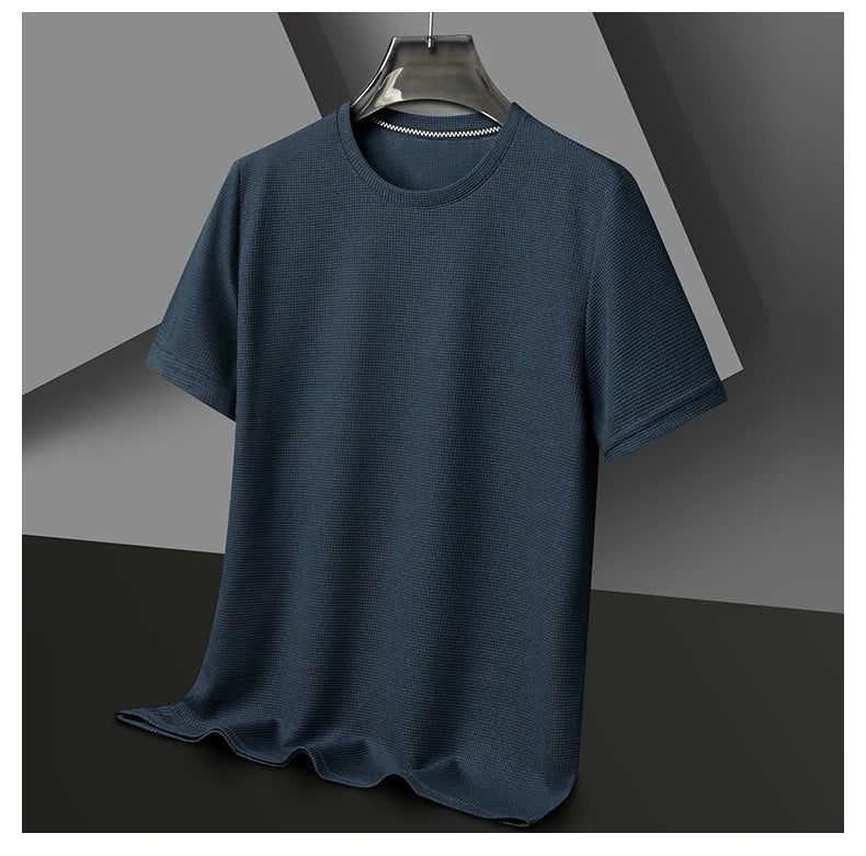 Introducing our new summer waffle-textured round neck short-sleeved t-shirt for men, combining comfort and style effortlessly.