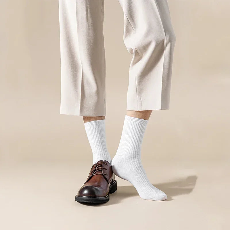 Embrace the comfort and style of these 100% cotton men's socks. Perfect for casual or business wear, these breathable, deodorant socks will keep you feeling fresh on all your winter travels.