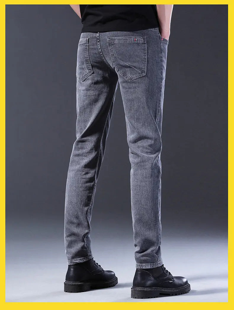 Discover our latest fashion: men's straight grey middle-waist casual denim trousers, blending style and comfort effortlessly.