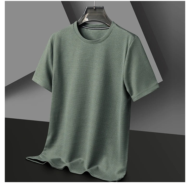 Introducing our new summer waffle-textured round neck short-sleeved t-shirt for men, combining comfort and style effortlessly.