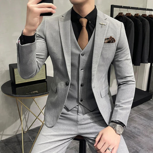 ( Jacket + Vest + Pants ) High-end Boutique Fashion Solid Color Men’s Casual Business Suit 3-Piece Set. Ideal for grooms and weddings, this stylish ensemble offers sophistication and versatility for any formal occasion.