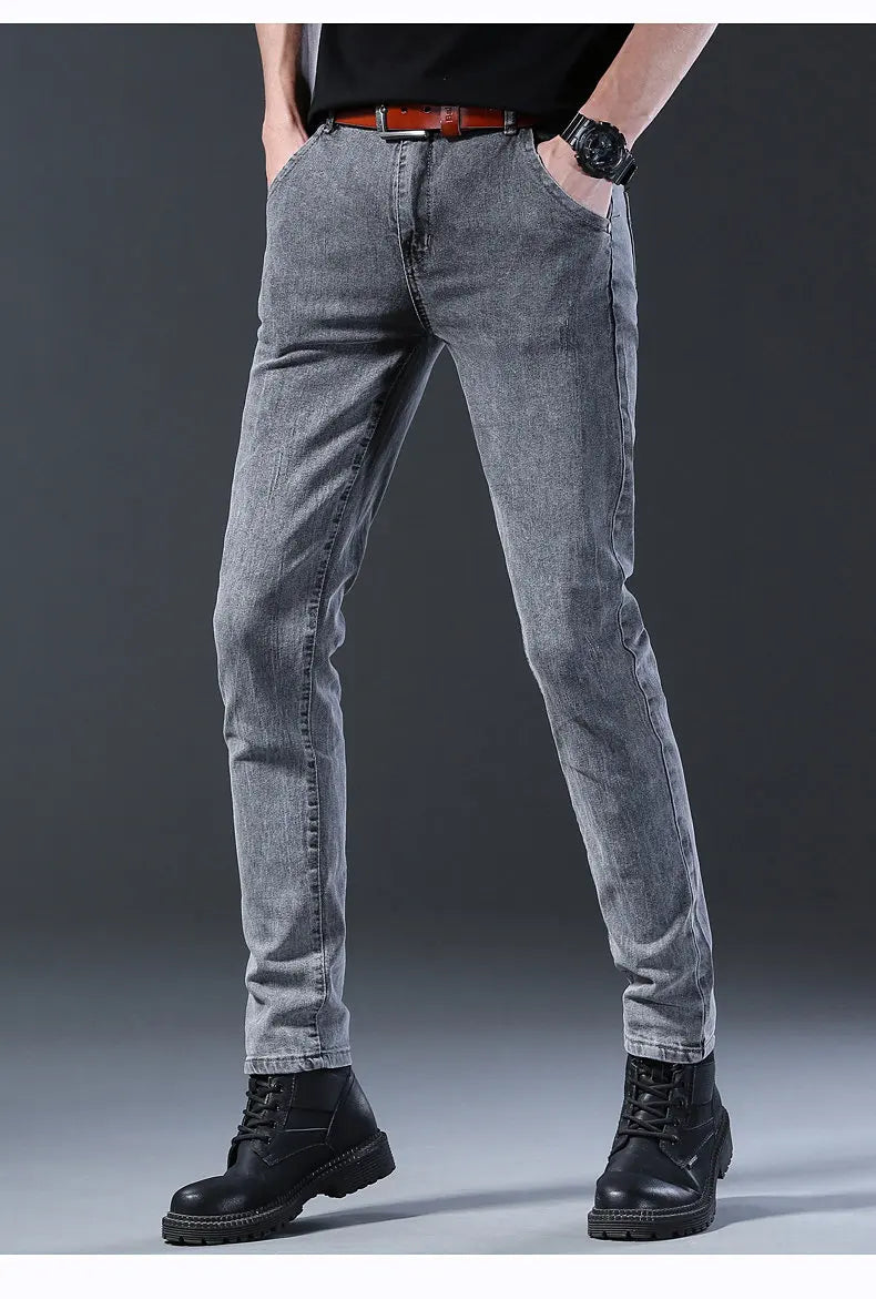 Discover our latest fashion: men's straight grey middle-waist casual denim trousers, blending style and comfort effortlessly.