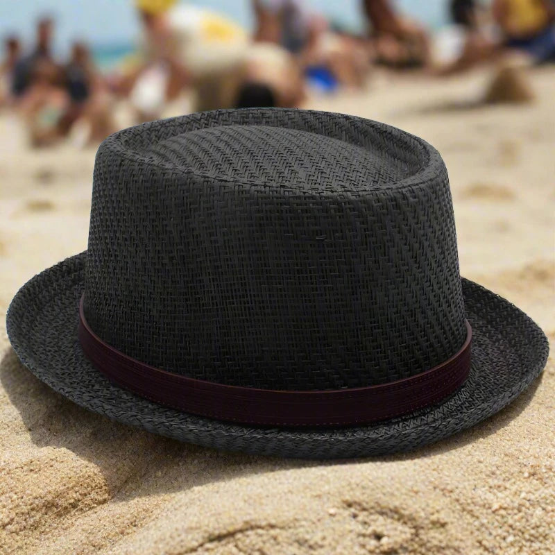 "Elevate your summer style with our Men's Straw Pork Pie Hats – perfect for outdoor adventures, beach days, and travel. Available in US size 7 1/4 and UK size L."