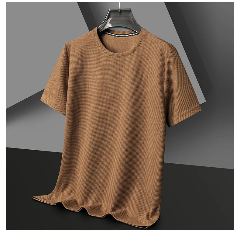 Introducing our new summer waffle-textured round neck short-sleeved t-shirt for men, combining comfort and style effortlessly.