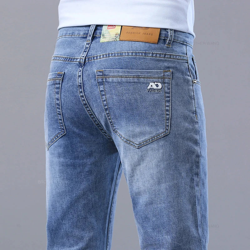 "Upgrade your wardrobe with our stylish and comfortable light blue slim jeans, perfect for spring and summer casual wear."