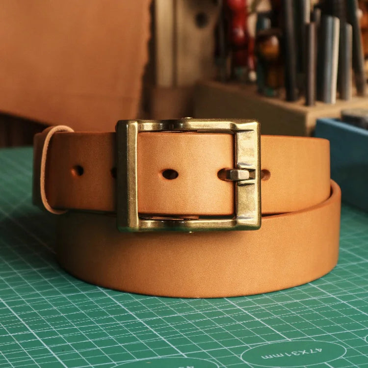 A top-quality natural-coloured cowhide belt with a copper buckle, perfect for enhancing your everyday style with casual luxury.